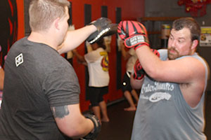 kickboxing classes in lakeland fl, kickboxing near me, kickboxing near me lakeland fl, lakeland, fl, kickboxing, women, group fitness, kickboxing classes, kickboxing classes for men